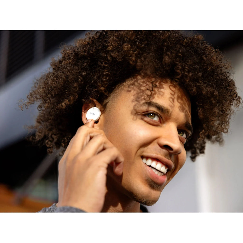 Denon PerL wireless in-ear headphones, lifestyle, worn
