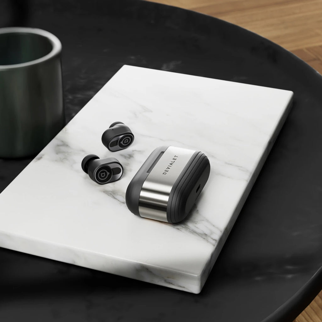 Devialet Gemini II wireless in-ear headphones, black earbuds styled lifestyle
