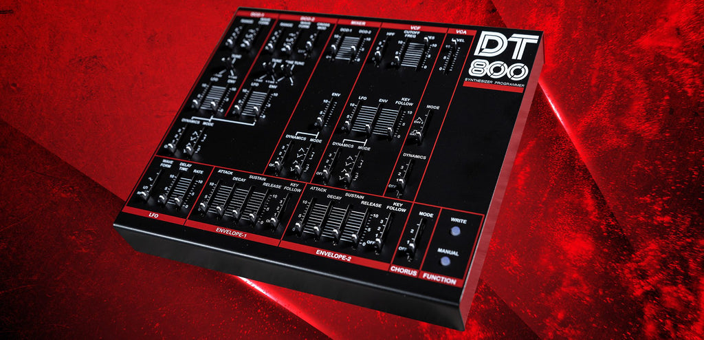 Dtronics DT-800 synthesizer front view showing knobs, buttons, and display for electronic music production.