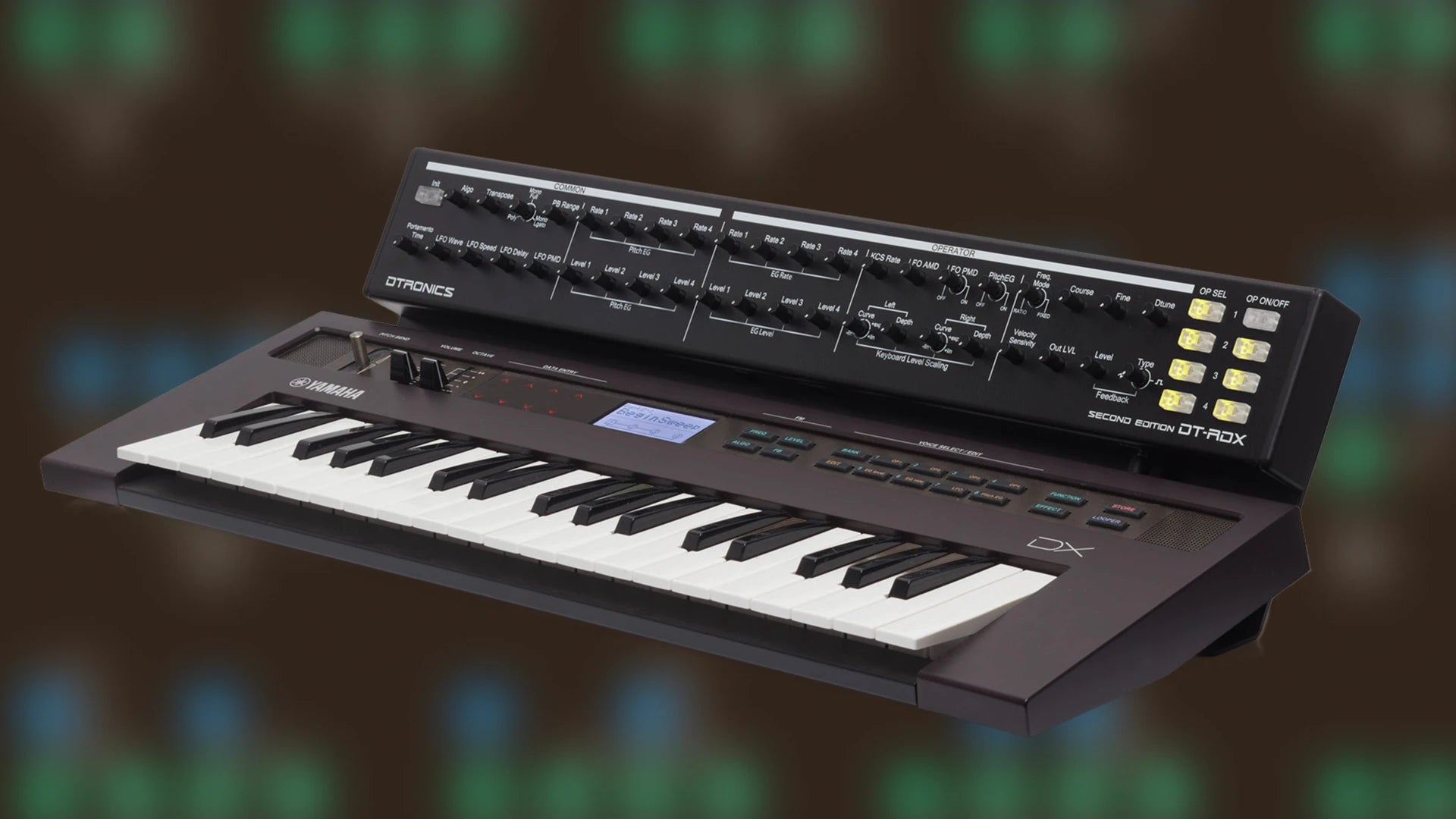 Dtronics DT-RDX-V2 synthesizer with multiple knobs, buttons, and a digital display, showcasing its compact, professional design.