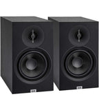 ELAC Debut B6.3 passive bookshelf speakers showing sleek black cabinets and front grilles in a home audio setup
