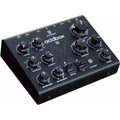 Erica Synths Acidbox III effects pedal with colorful knobs and input/output jacks, used for acid basslines and synth sounds.