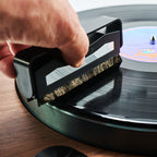 Essentials TT Vinyl Kit 100, TT Brush Silver cleaning a record on a turntable