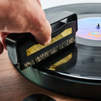 Essentials TT Vinyl Kit 300, TT Brush Gold cleaning a record on a turntable