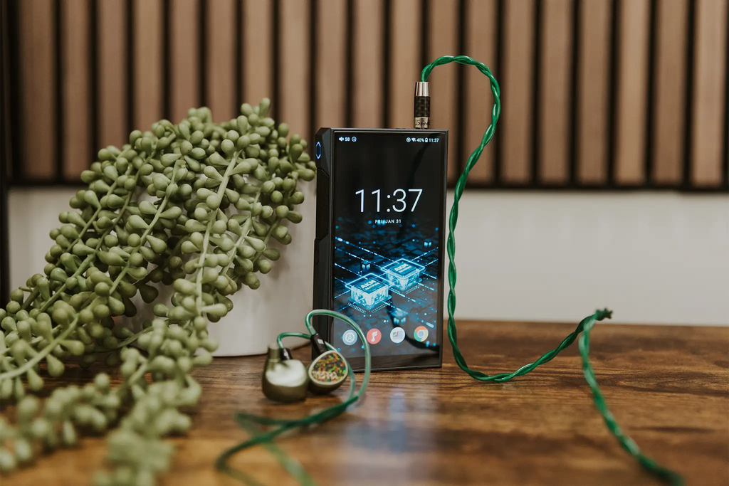 FiiO M23 portable music player with sleek black design, touchscreen display, and headphone jack, ideal for high-resolution audio.