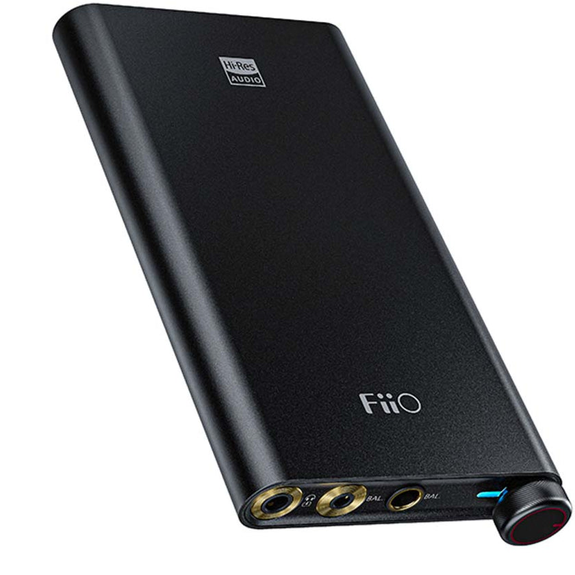 FiiO Q3 headphone amplifier and DAC with sleek design and multiple connectivity options for enhanced audio experience.