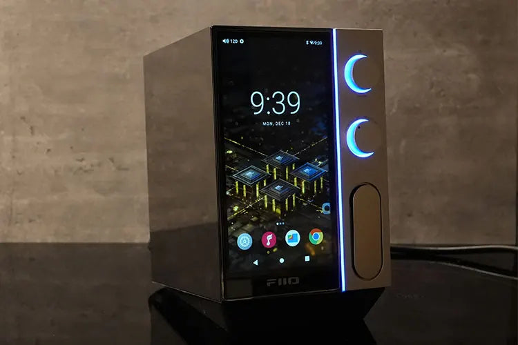 FiiO R9 music streamer front panel showing control buttons and display screen for high-quality audio streaming.