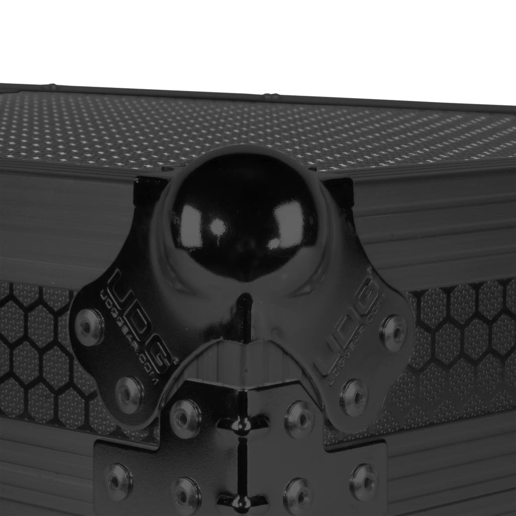UDG Ultimate Flight Case AlphaTheta DDJ-GRV6 black DJ flight case with laptop shelf and steel ball corners.