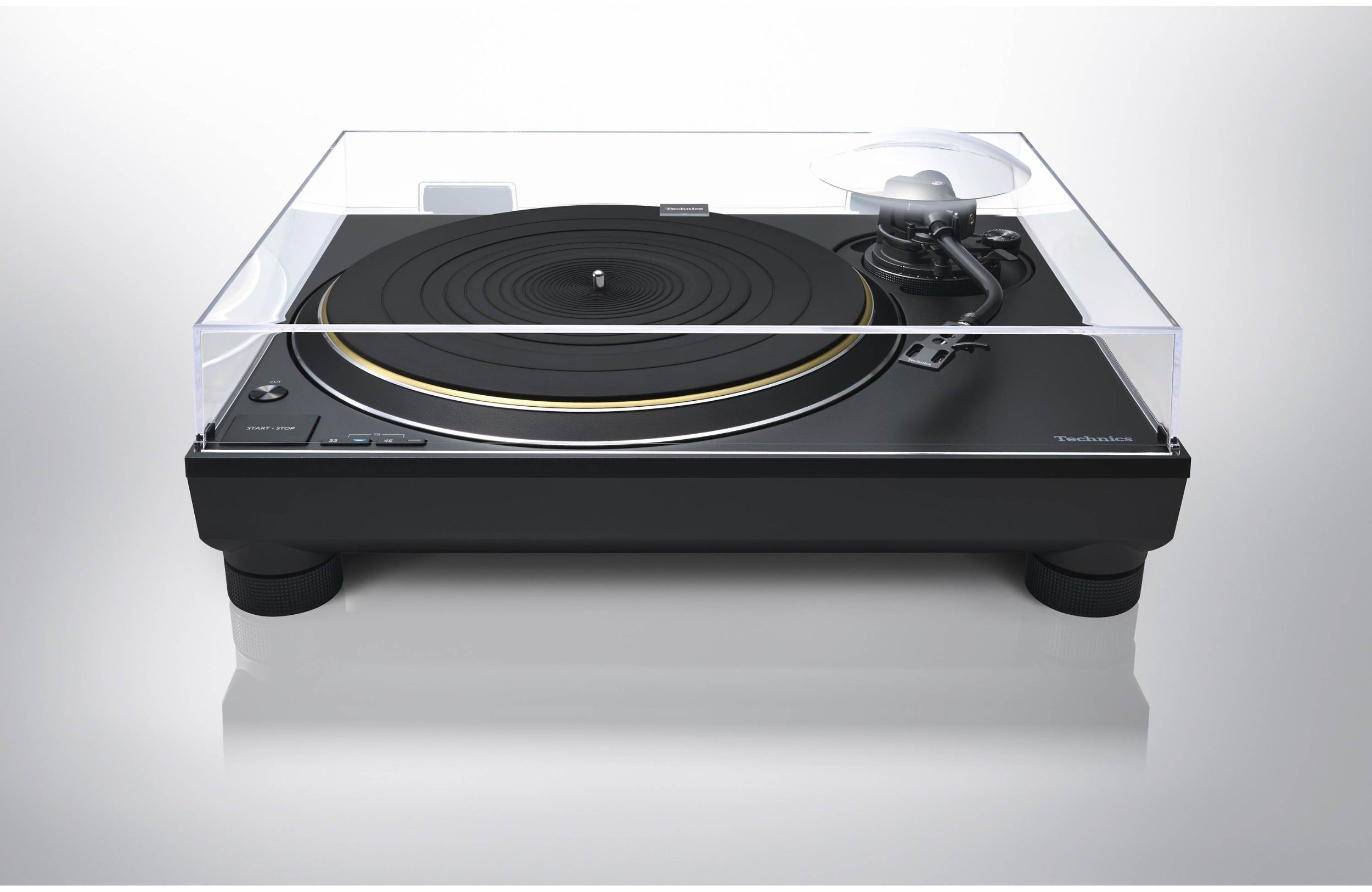 Technics SL-1300G turntable with wooden plinth, tonearm and platter, showcasing a sleek, modern design for high-quality vinyl listening