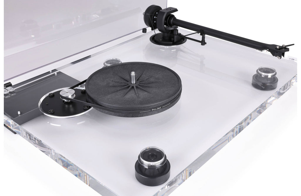 Pro-Ject XA B turntable with wooden plinth and aluminum tonearm, showcasing its sleek design and high-quality build.