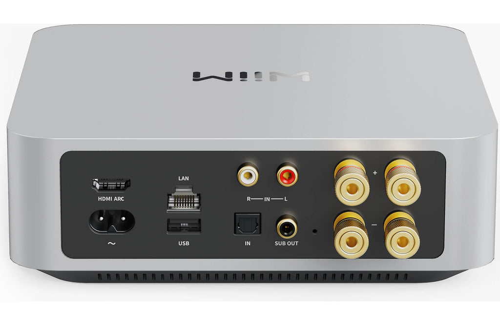 WiiM AMP music streamer device with sleek design and control buttons, used for high-quality wireless audio streaming.