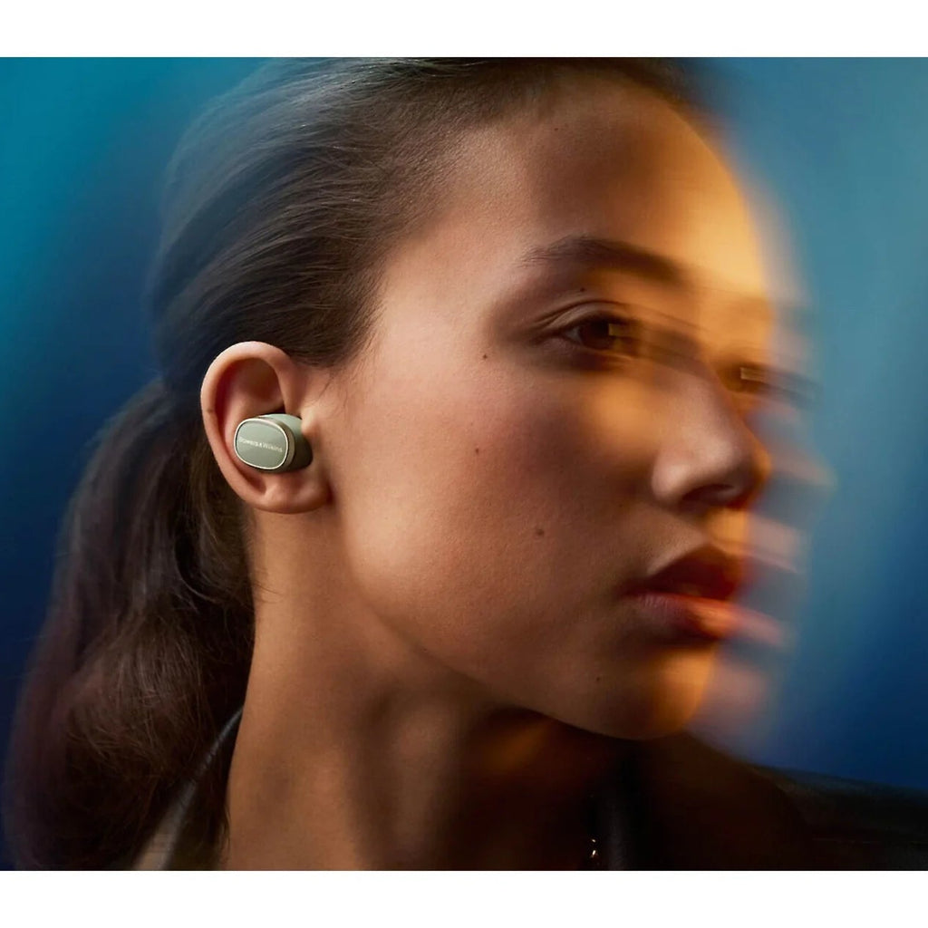 Bowers & Wilkins Pi8 wireless in-ear headphones with sleek black design and in-ear fit, shown in close-up.