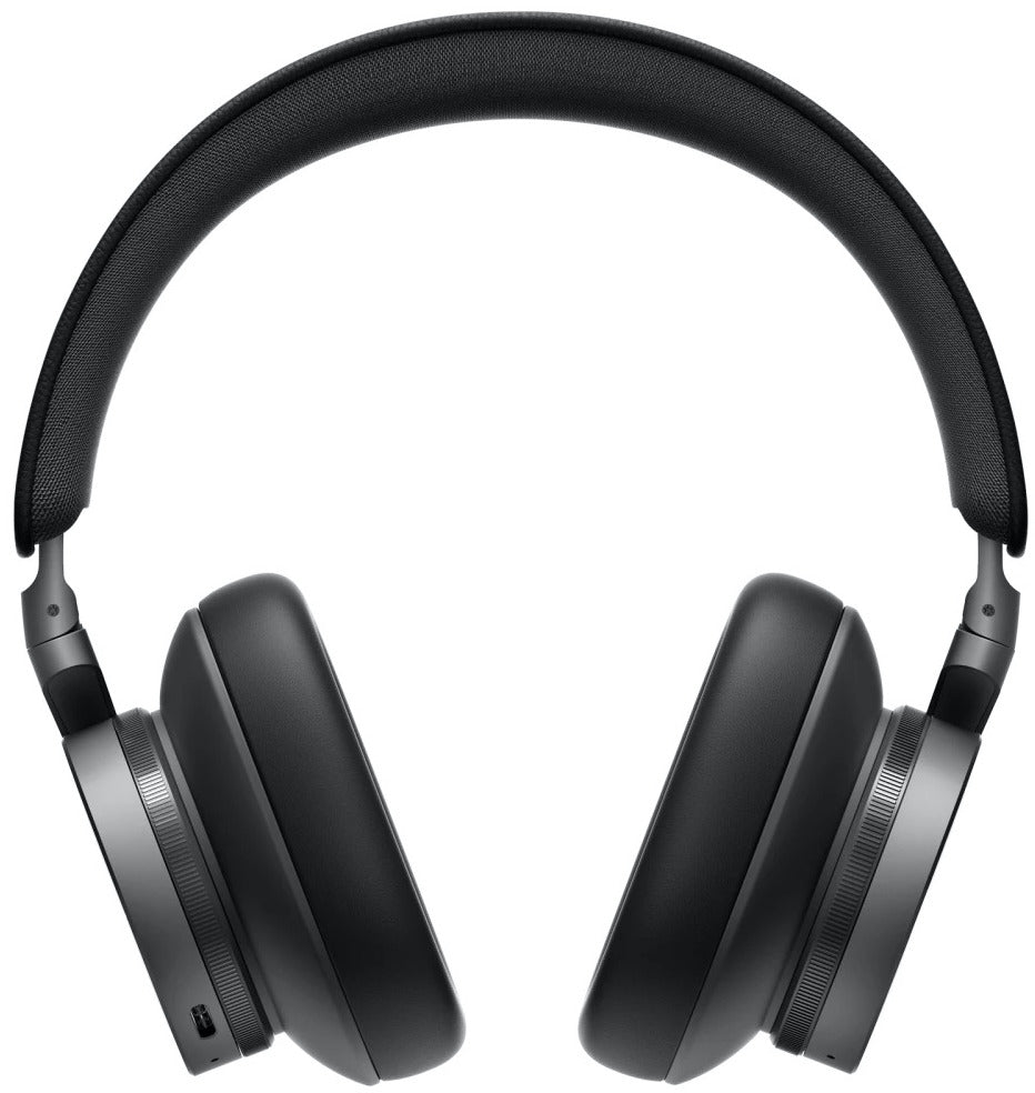 Close-up of Bang & Olufsen Beoplay H95 wireless headphones with cushioned ear cups and sleek black design.