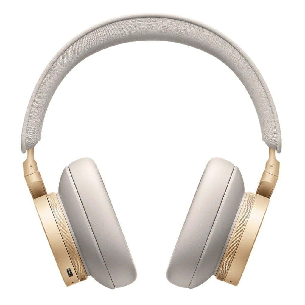 Bang & Olufsen Beoplay H95 wireless headphones in gold with cushioned ear cups and sleek design.
