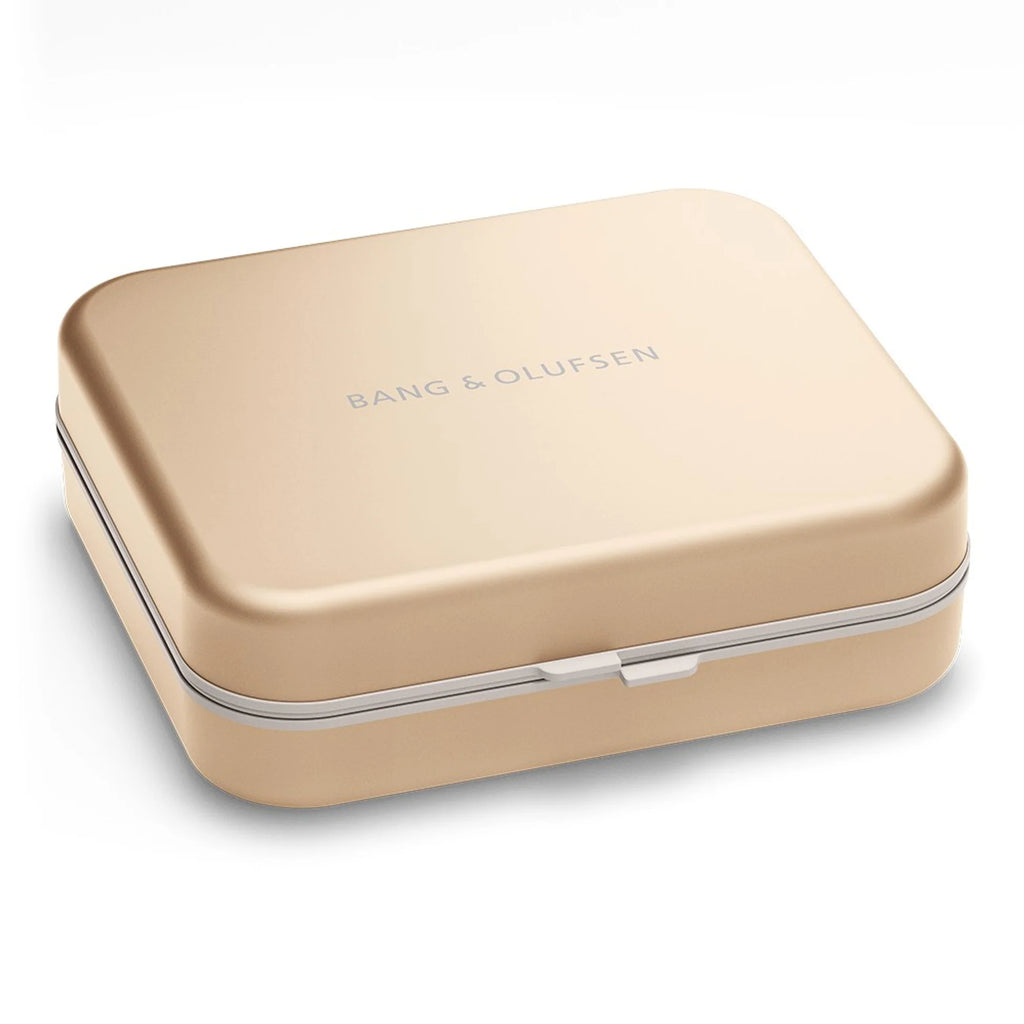 Bang & Olufsen Beoplay H95 wireless headphones in sleek gold with cushioned ear cups and modern design.