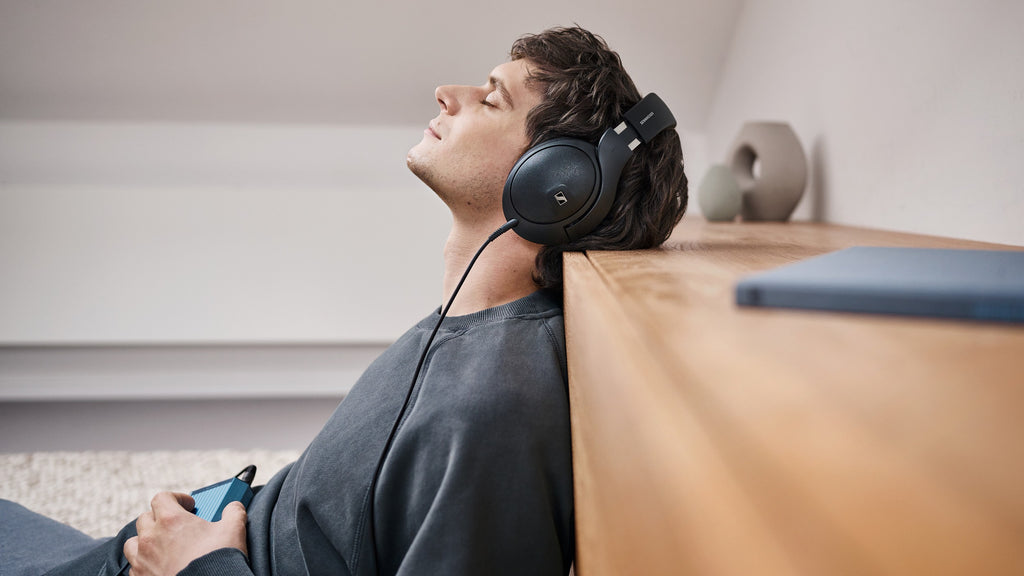 Sennheiser HD 620S wired headphones with over-ear design and plush ear cups, shown in an application setting.