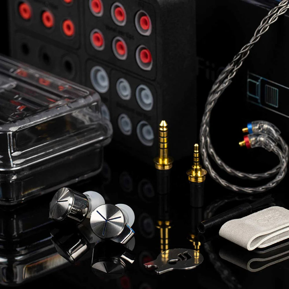 FiiO FA7S in-ear headphones with black and silver design, featuring multiple ear tips and a detachable cable for high-quality audio.