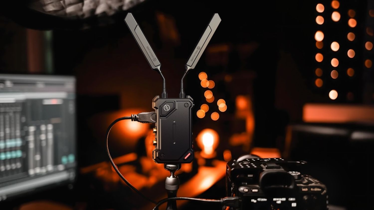 Hollyland Cosmo C2 wireless video transmission system with two transmitters and one receiver for professional video setup.