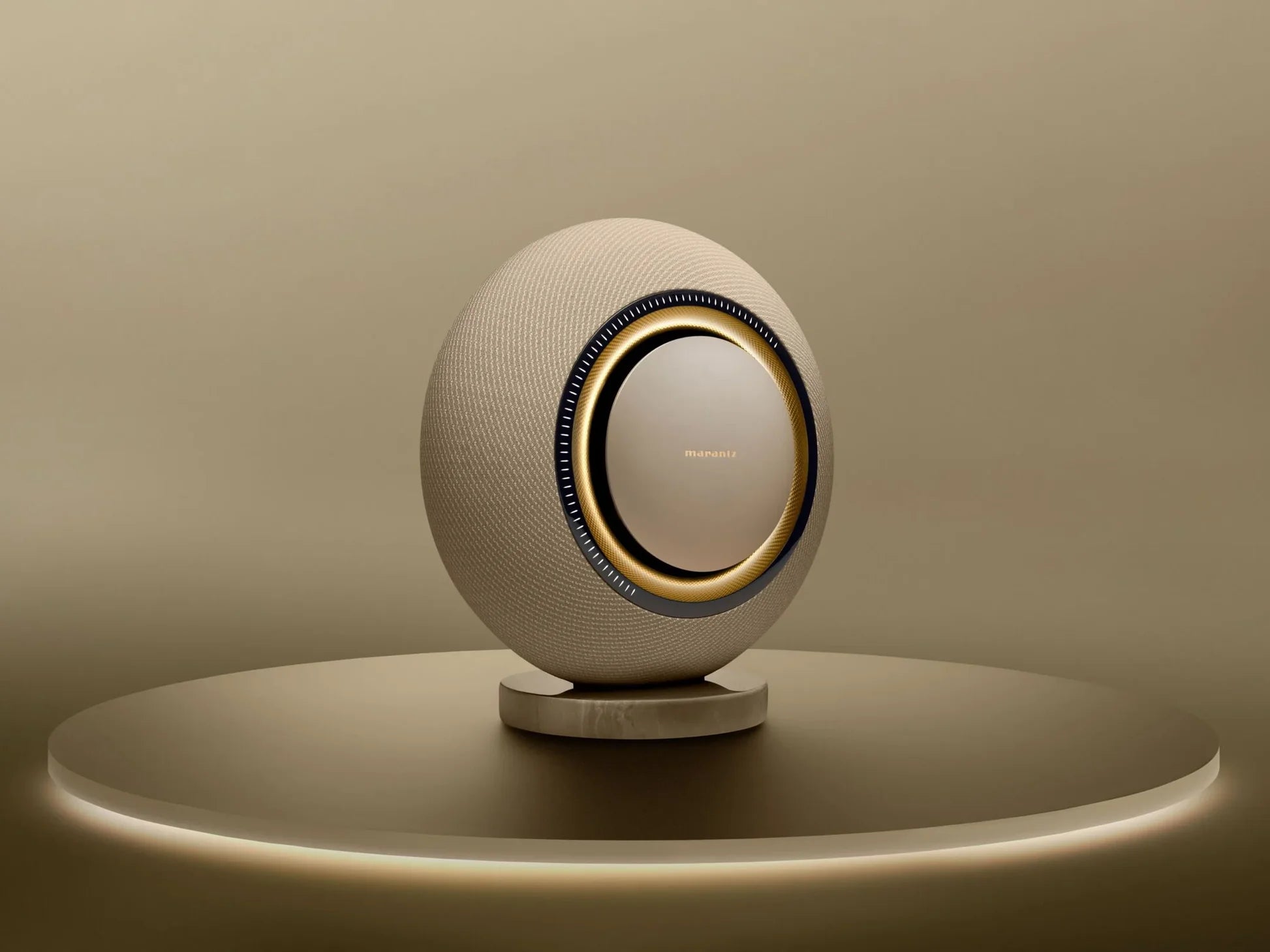 Marantz Horizon wireless speakers in champagne finish, sleek modern design with fabric grille and compact form for premium audio.