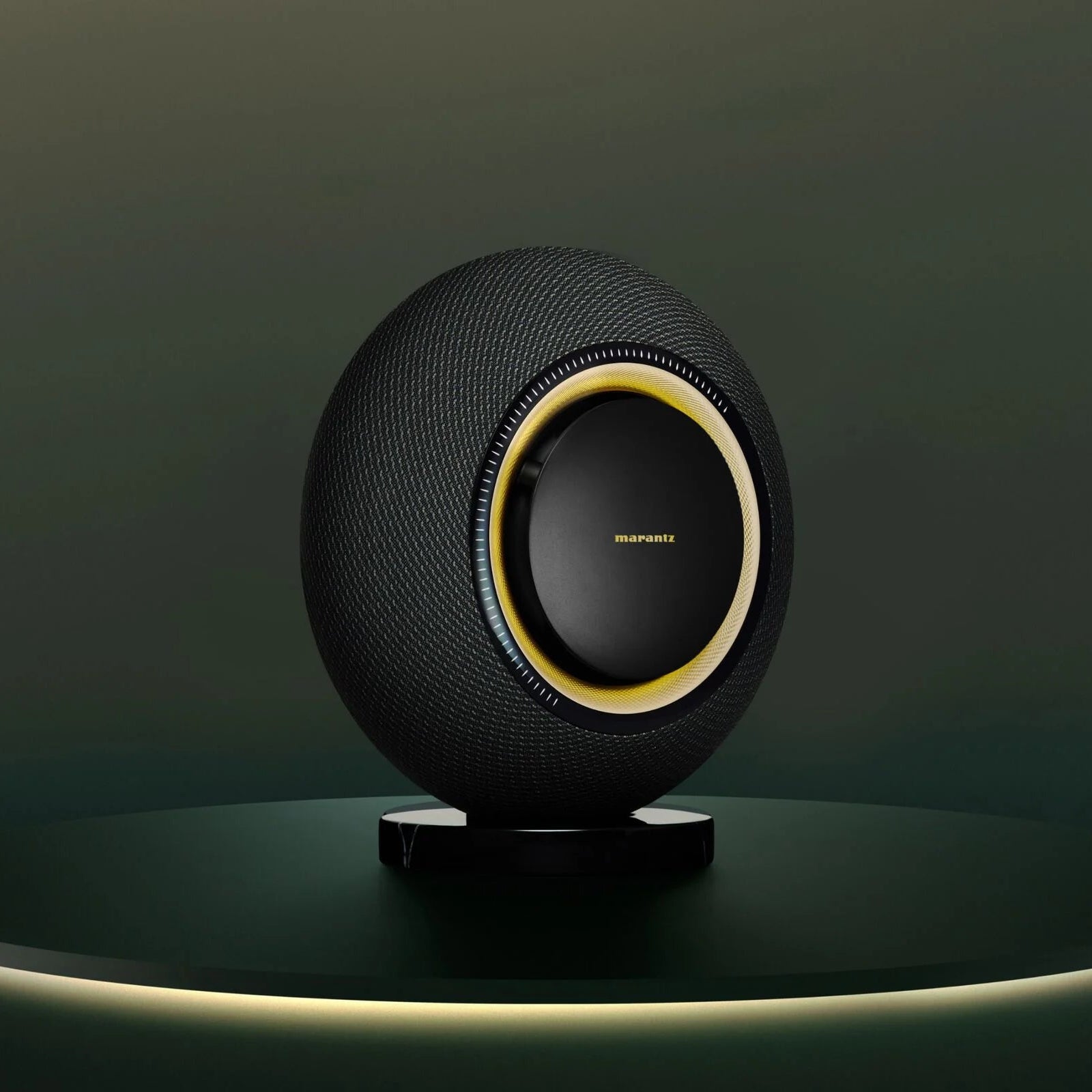 Marantz Horizon wireless speakers in midnight finish, sleek design with fabric-covered speakers and modern audio equipment appearance.