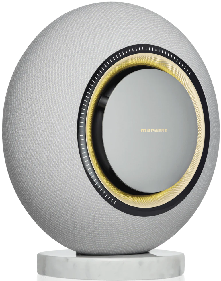 Marantz Horizon wireless speakers with sleek black design and modern controls, shown on a wooden surface.
