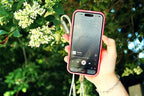 iFi Audio GO cable in use with a smartphone outdoors