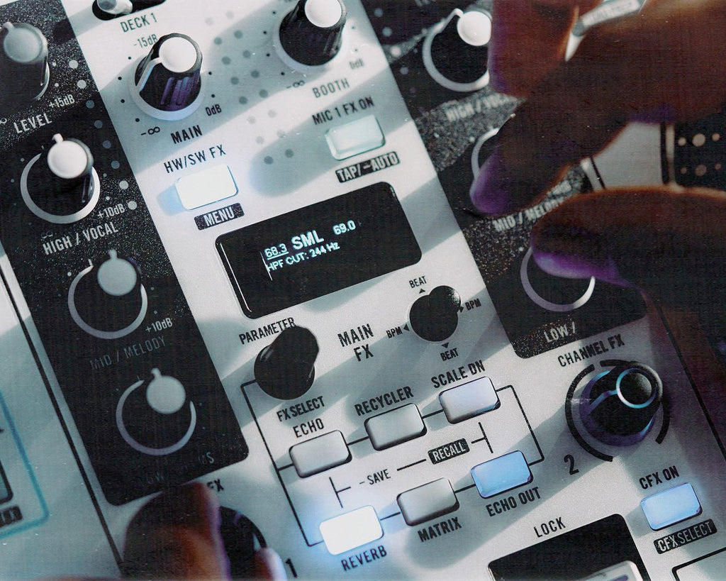 Rane One MKII DJ controller with jog wheels, mixer knobs, and performance pads for professional DJ mixing and scratching.