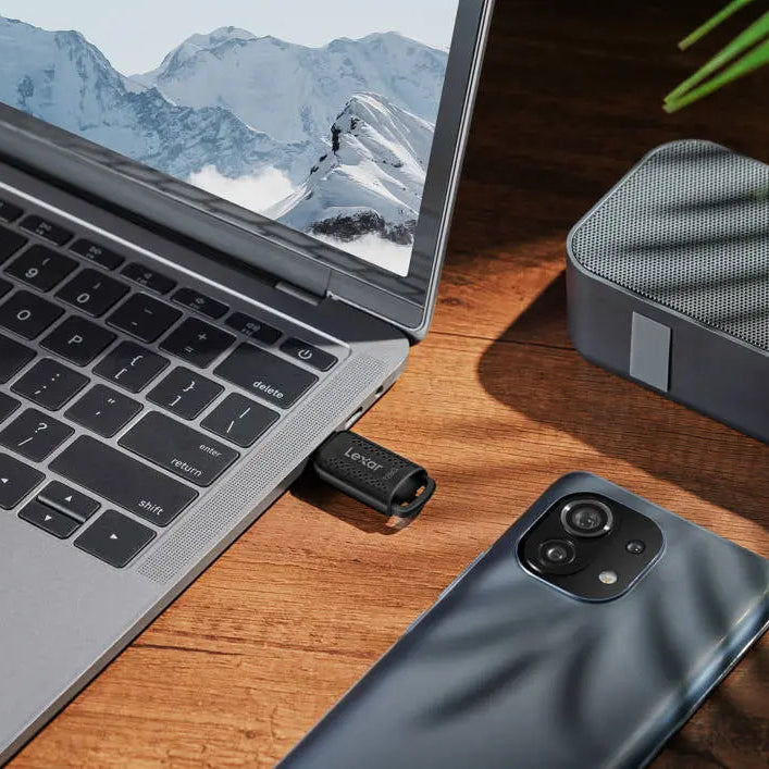 Lexar JumpDrive V400 USB 3.0 flash drive showing sleek black design and USB connector for quick data transfer.