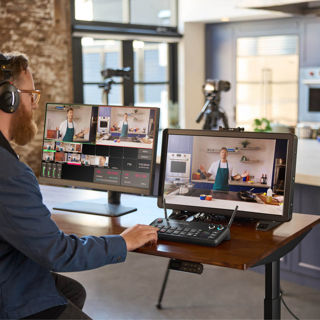 Rode RodeCaster Video controller for video editing, featuring multiple buttons and controls on a sleek black device.