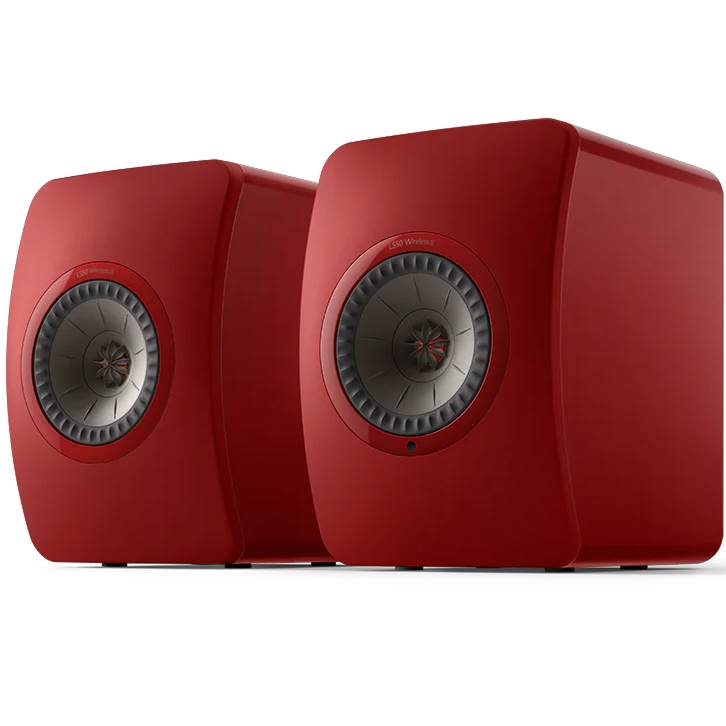 KEF LS50 Wireless II wireless speakers showing sleek black cabinets and modern design with speaker grilles.