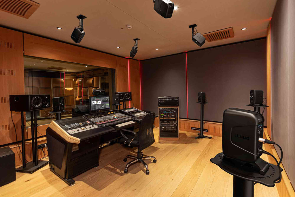 IK Multimedia iLoud MTM MK2 active nearfield monitors shown with sleek black design and front-facing speakers for studio use.