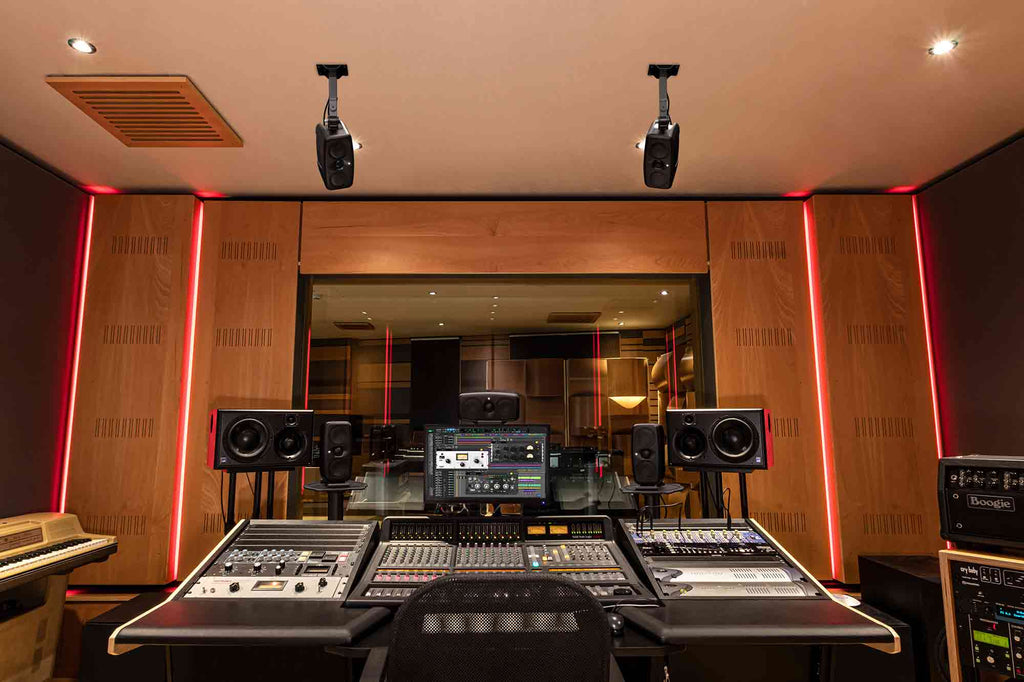 IK Multimedia iLoud MTM MK2 active nearfield monitors shown with sleek black finish and front controls for professional audio monitoring.