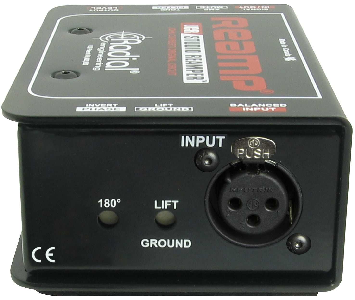 Radial Engineering JCR DI box shown from the back, featuring input and output connections for professional audio signal routing.