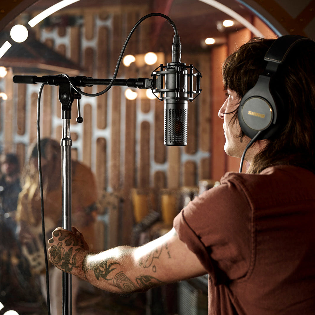 Shure KSM40C condenser microphone with a black body and grille, designed for studio and live vocal recording.