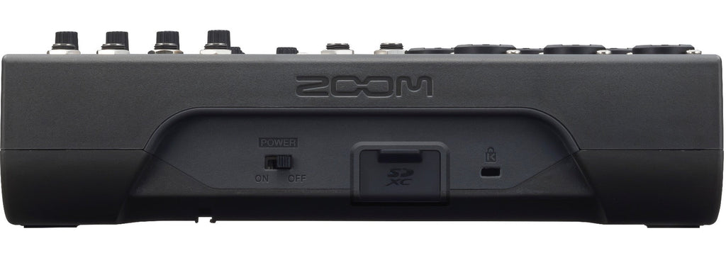 Zoom LiveTrak L-8 digital mixer with multiple input channels, sliders, and control knobs for professional audio mixing.