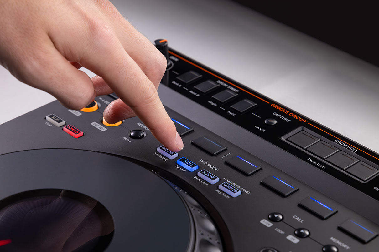 AlphaTheta DDJ-GRV6 DJ controller in a lifestyle setting, showcasing its professional layout and controls for DJs.