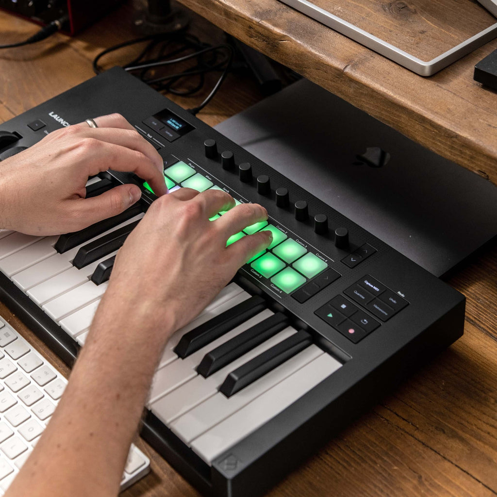 Novation Launchkey 25 MK4 MIDI keyboard with 25 keys, control knobs, and pads for music production and performance.