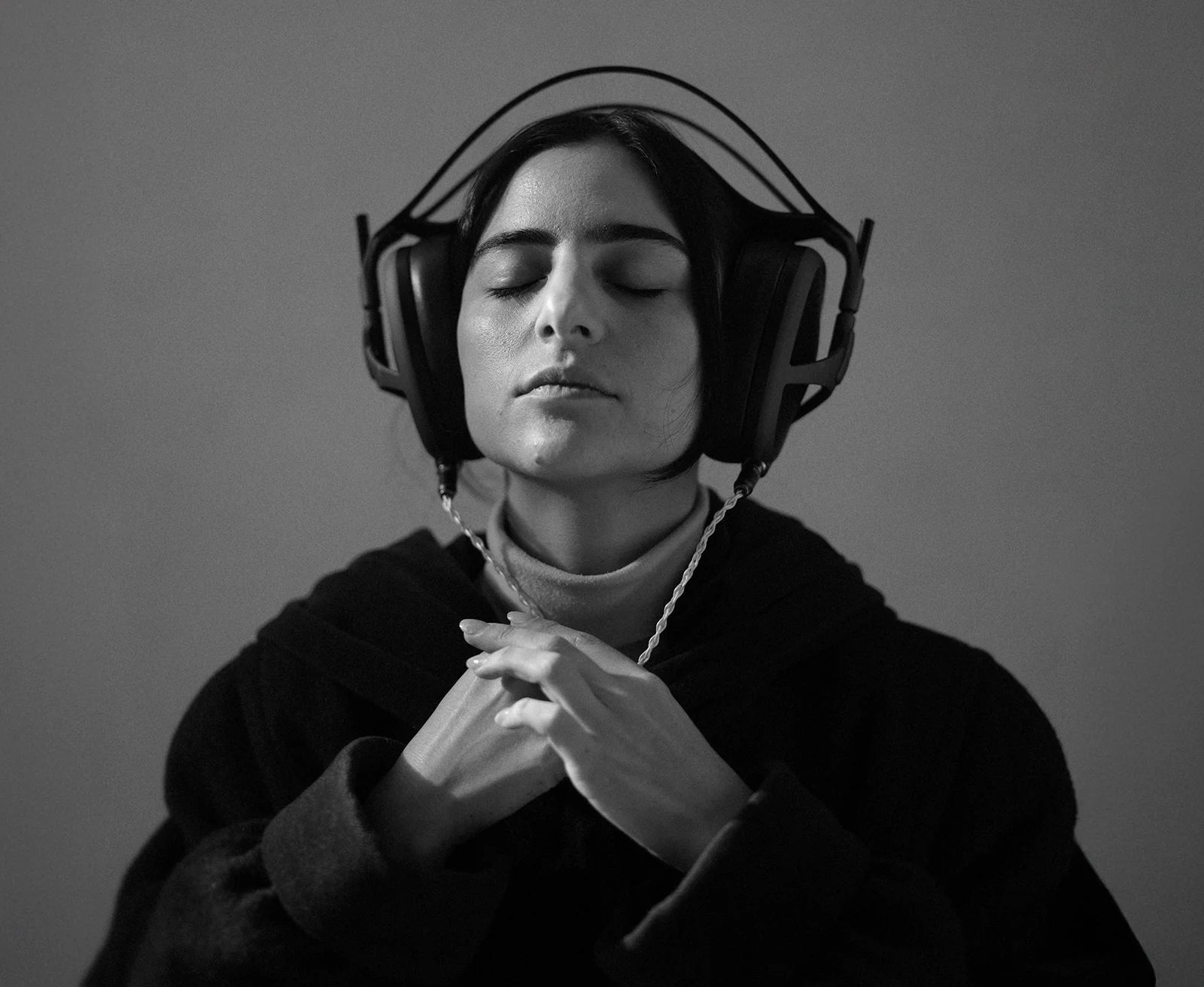 Meze Audio Elite Tungsten wired headphones with sleek black design and cushioned ear cups for comfortable listening.
