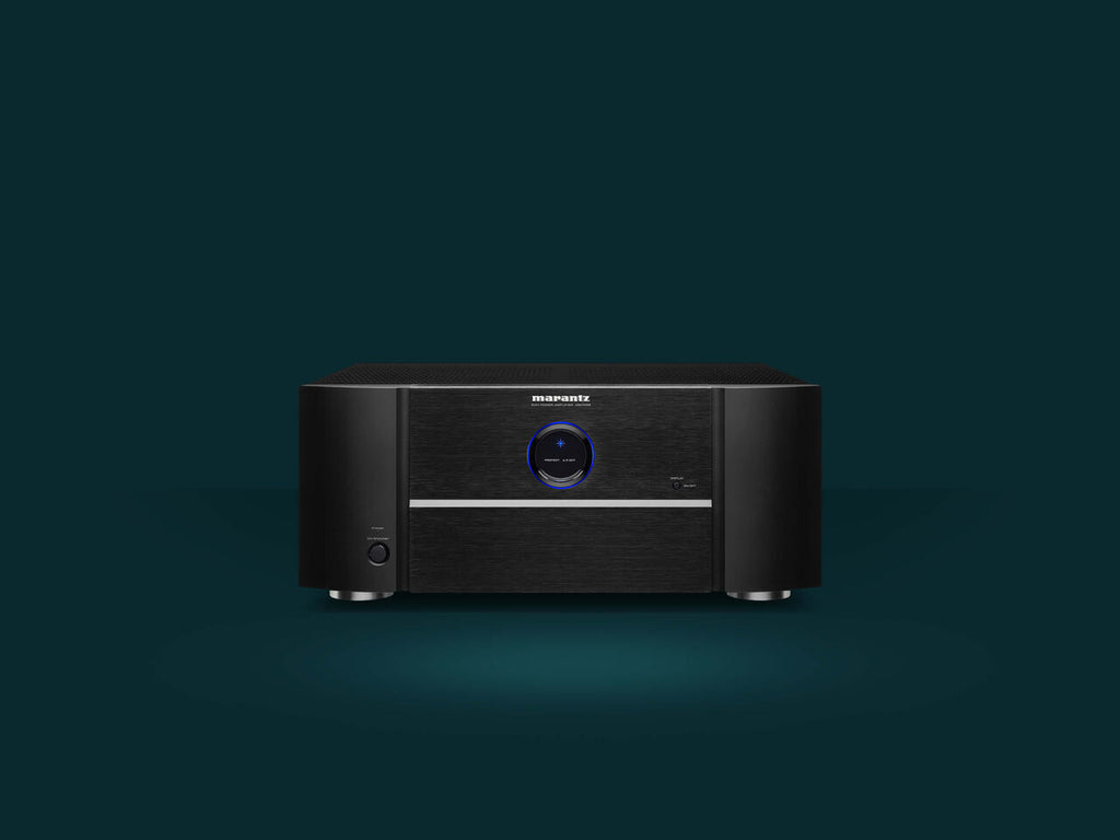 Marantz MM7055 stereo amplifier with sleek design and multiple audio input options, ideal for high-quality home audio systems.