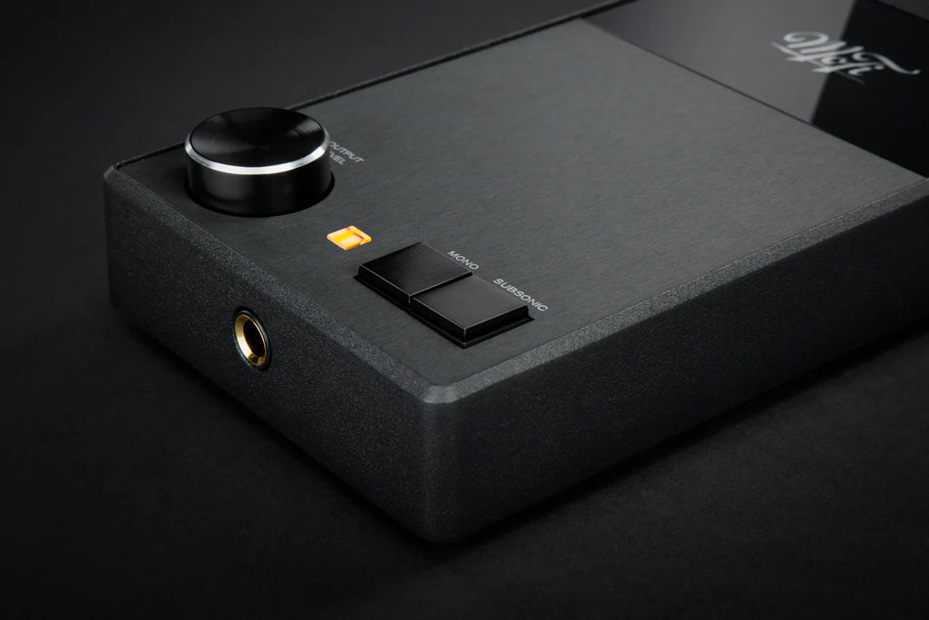Close-up of MoFi Electronics UltraPhono phono preamp showing detailed control knobs and input connections.