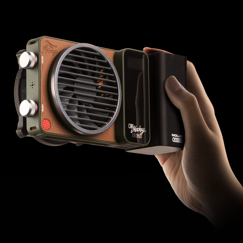 Zhiyun Molus X100 RGB light displaying vibrant multicolor lighting effects with adjustable brightness and color options.
