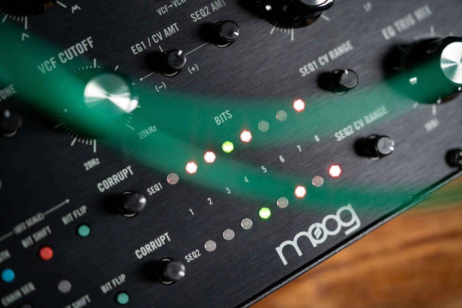 Close-up of Moog Labyrinth synthesizer with detailed knobs and controls, showcasing its vintage-style analog interface.