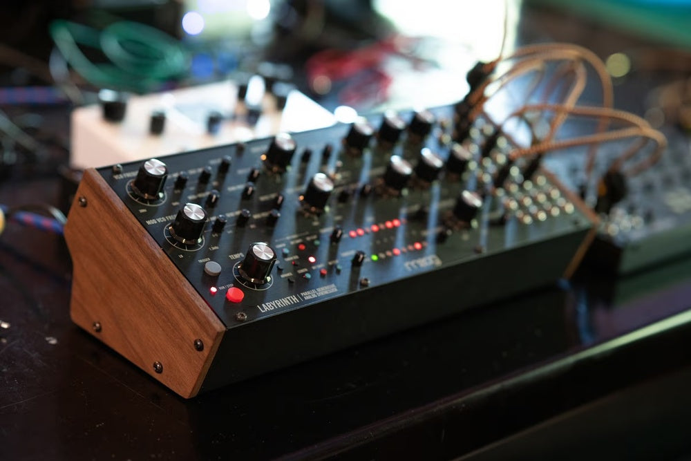 Moog Labyrinth synthesizer with various knobs and controls, showcasing Moog's signature analog design and interface.