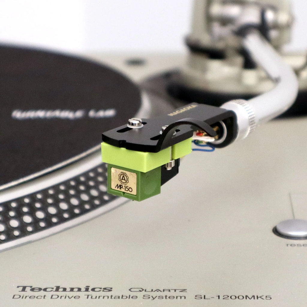 Nagaoka MP-150H turntable cartridge with headshell, featuring a sleek black design and stylus for high-quality vinyl playback.
