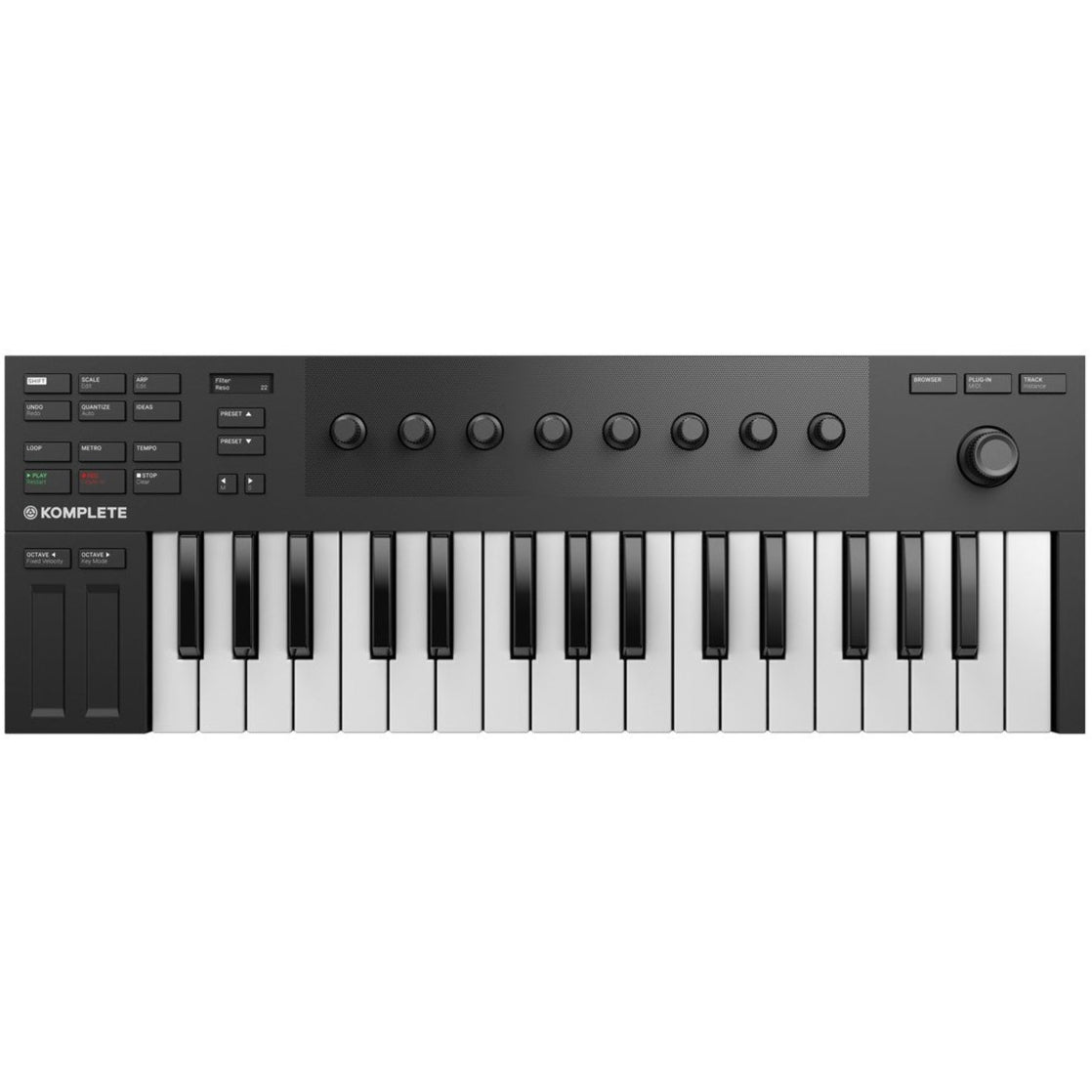 Native Instruments Komplete Kontrol M32 MIDI keyboard with 32 keys and control knobs, shown on a music studio desk.
