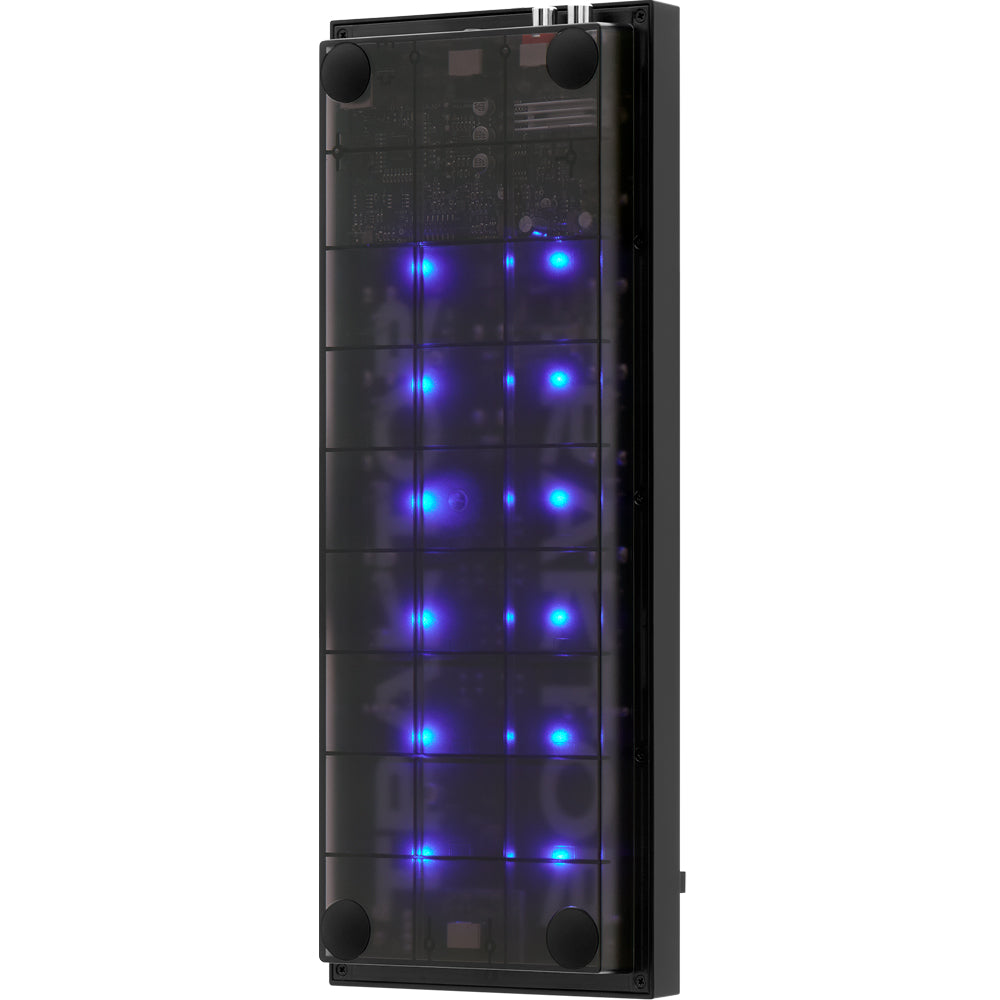 Native Instruments Traktor Z1 MK2 DJ controller, side view with blue lit interior.