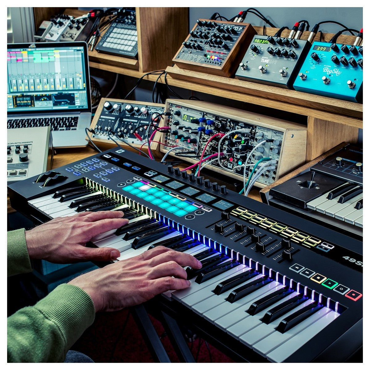 Novation 49SL MK3 MIDI keyboard with 49 keys, control knobs, and buttons for music production and performance.