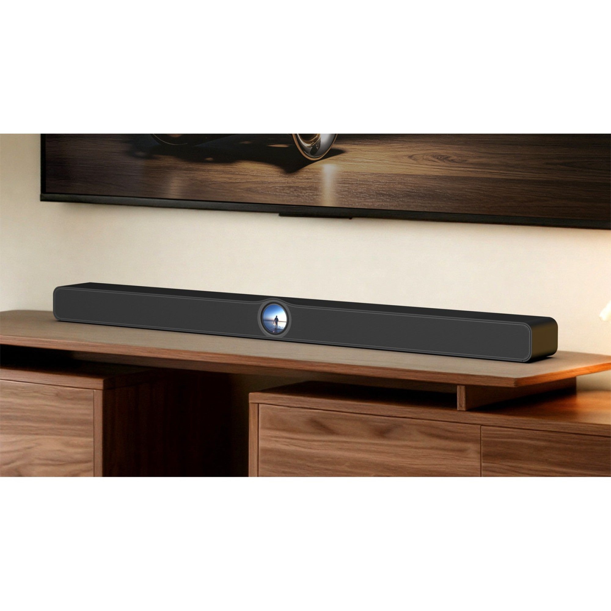 WiiM Bar Black on a media console below a TV