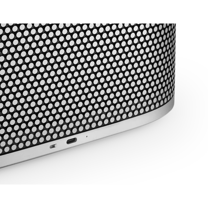 Bang & Olufsen Beosound A5 portable speaker with sleek design and fabric cover, shown in a pack-shot image.