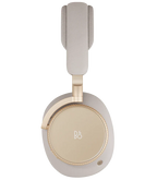 Bang & Olufsen Beoplay H100 wireless headphones with an elegant hourglass sand design, shown from the front.